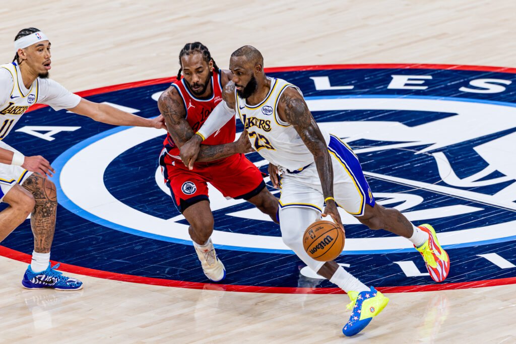 Los Angeles Lakers Lebron James #23 Kawhi Leonard #2 during a basketball game vs the Los Angeles Clippers on December 15th, 2025, at the Intuit Dome in Inglewood California. Photo Credit - Bruno De Witt Zanotto for LAMomentum