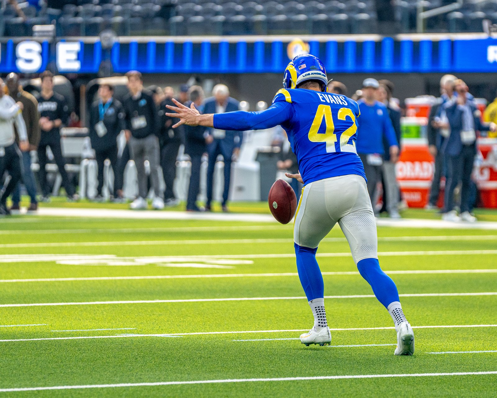Rams punter Ethan Evans kicks during the Rams vs Lions game at SoFi Stadium