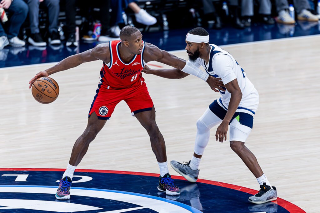Los Angeles Clippers Kris Dunn (8) dribbles the ball at an NBA game vs Minnesota Timberwolves at the Intuit Dome in Inglewood California on February 26th, 2026 - Photo Credit - Bruno De Witt Zanotto for LAMomentum
