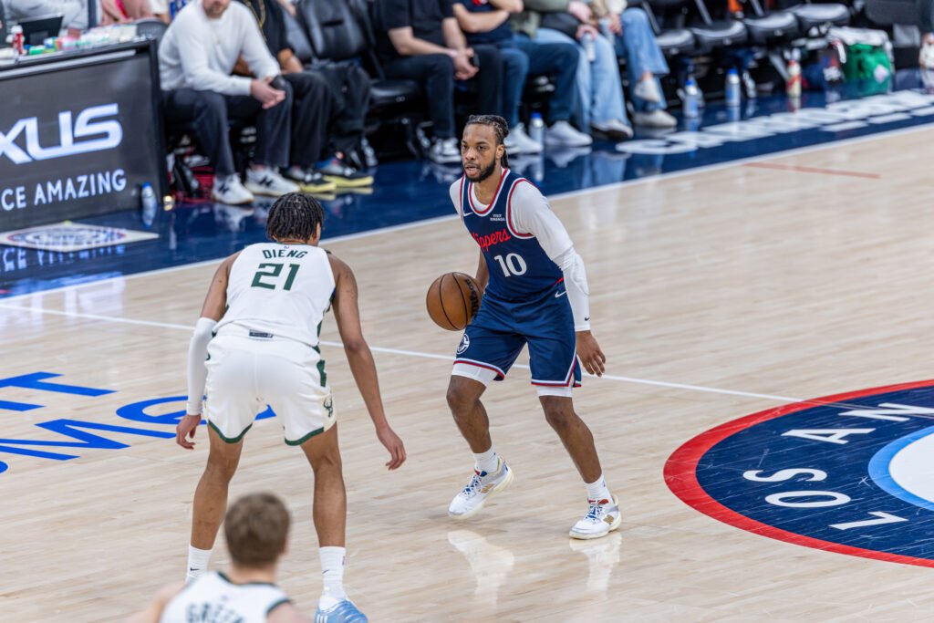 Los Angeles Clippers Darius Garland dribbles the ball at an NBA Basketball game vs the Bucks at Intuit Dome in Inglewood California on March 23rd, 2026 - Photo Credit - BZFilms Sports Marketing Agency - Bruno De Witt Zanotto