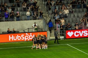 Angel City FC team celebrating vs Houston Dash at BMO Stadium on March 27th, 2026 - Photo Credit - Henry Caceres for LAMomentum.