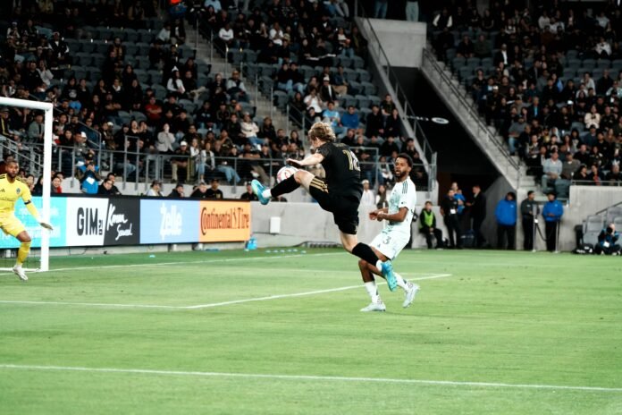LAFC vs COLORADO RAPIDS 2026, Jacob Shaffelburg #18, controls ball from a pass-far-right, MLS match at BMO Stadium on 04/22/2026 (Photo By: Normando Mariscal for LAMOMENTUM)