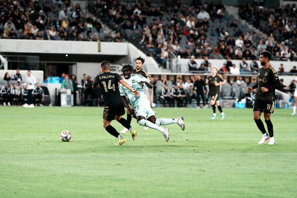 LAFC vs COLORADO RAPIDS 2026, Sergi Palencia #14, with a tackle and foul-shortly after against Minnesota United FC winger, MLS match at BMO Stadium on 04/22/2026 (Photo By: Normando Mariscal for LAMOMENTUM)