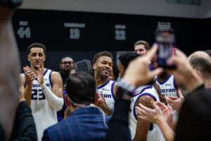 Dexter Dennis (#9) for the Stockton Kings lifting the trophy, honoirng their win in the Western Conference against the South Bay Lakers on April 5, 2026. Photo Credit: Daisy Lopez