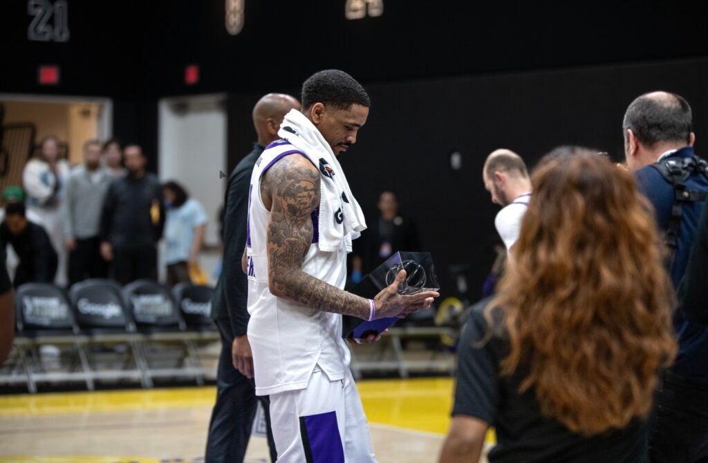 DaQuan Jeffries (#6) for Stockton Kings holding the Western Conference Champions trophy on April 5, 2026. Photo Credit: Daisy Lopez