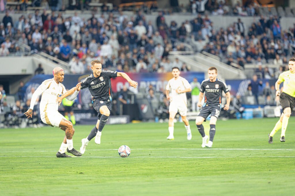 San Diego FC’s Marcus Ingvarsten (7) surges past LAFC’s Nkosi Tafari (91) in the first half, driving forward to give it off to a teammate on May 2, 2026 at Snapdragon Stadium in San Diego, CA. - Adrian Perez