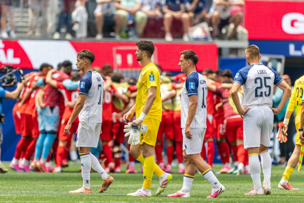 Bosnia players watch as Switzerland celebrates the win at a World Cup match at Sofi Stadium in Inglewood California on June 18th, 2026 - Photo Credit - BZFILMS Sports Marketing Agency - Bruno De Witt Zanotto