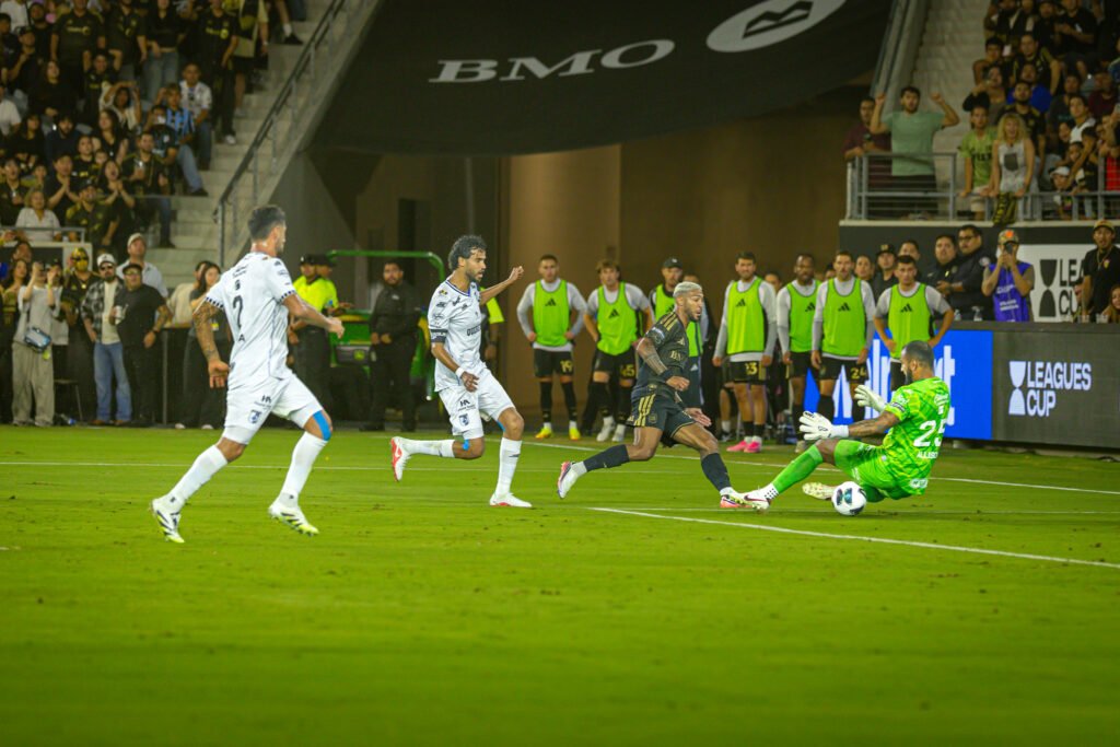 Another missed opportunity as LAFC's Denis Bouanga's (99) shot attempt is stopped by Querétaro FC's goalie Guillermo Allison (25) on Wednesday night at BMO Stadium in Los Angeles, CA - photo by Adrian Perez
