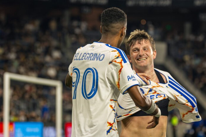 Anders Dreyer (10) celebrates his PK late in the game with Amahl Pellegrino (90) as San Diego FC takes the lead on Saturday night at BMO Stadium in Los Angeles, CA - photo by Adrian Perez