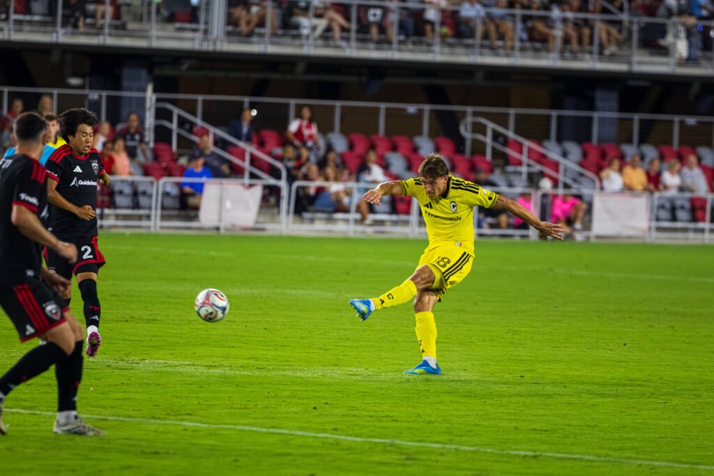 MLS - Columbus Crew's Malte Amundsen #18 taking a shot from outside the box at Audi Field in a MLS game in Washington DC on September 9th 2026. Photo Credits - Omar Yair Soto