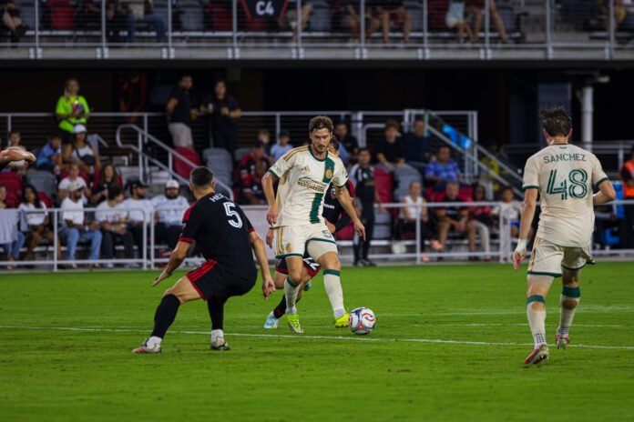 MLS - Atlanta United's Aleksei Miranchuk passing the ball to teammate #48 Cooper Sanchez at a MLS game at Audi Field in Washington DC on September 12, 2026. Photo Credits - Omar Yair Soto