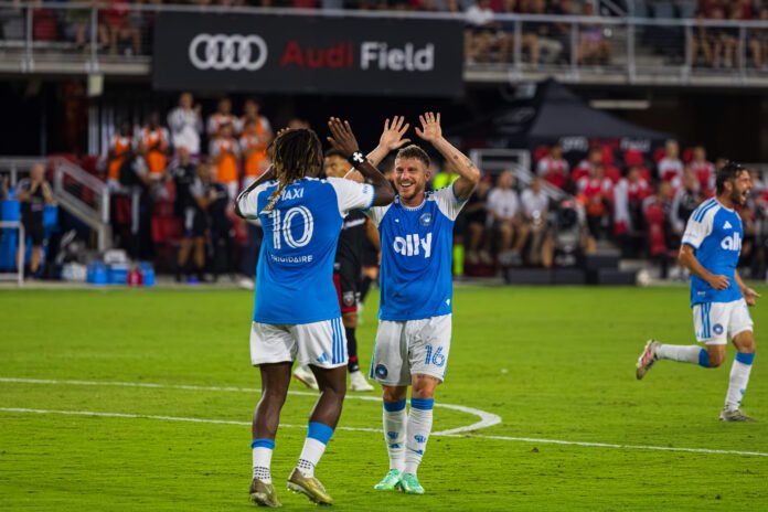 MLS - Charlotte FC's goal scorer Allan Saint-Maximin #10 celebrating with teammate Pep Biel #16 at a MLS game in Audi Field in Washington DC on September 19th 2026. Photo Credits - Omar Yair Soto