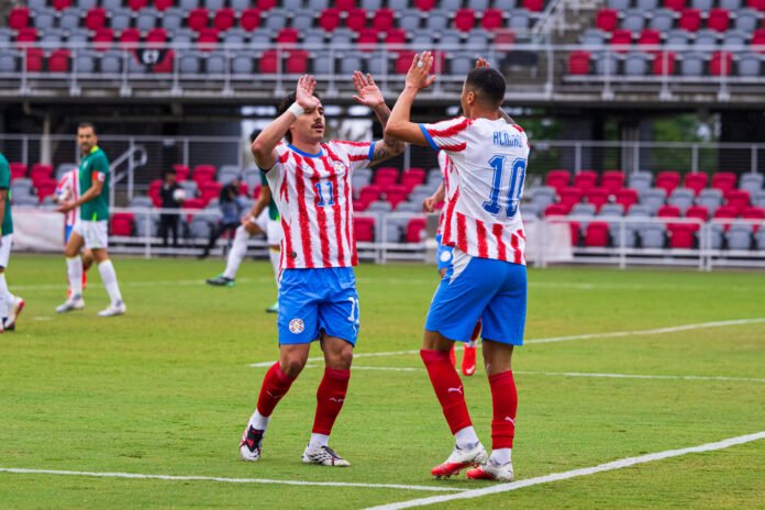 Paraguay's Miguel Almirón #10 celebrating with teammate Maurício #11 in a international friendly match at Audi Field in Washington DC on Sunday September 27th, 2026. Photo Credits - Omar Yair Soto