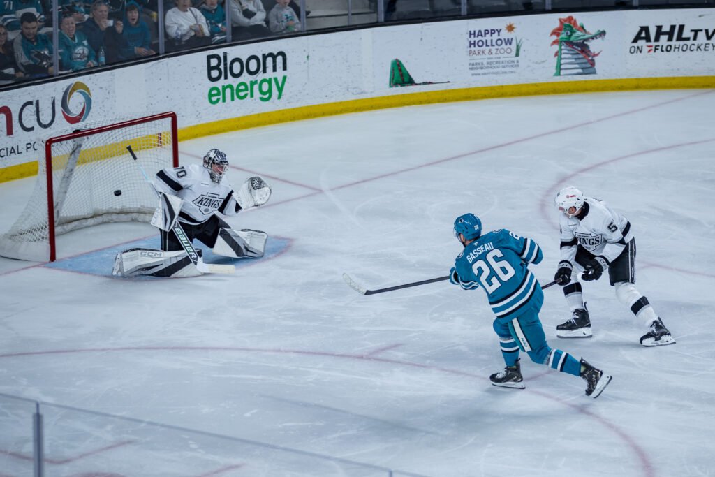 Andre Gasseau scores for the San Jose Sharks against the Los Angeles Kings during the 2026 Rookie Faceoff.