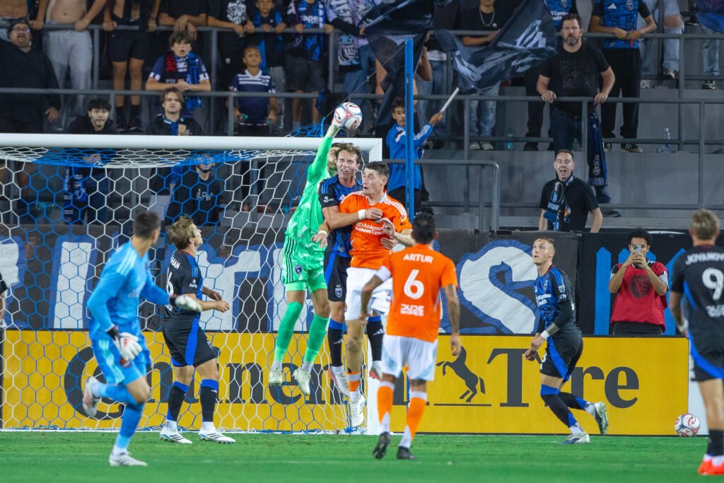 San Jose Earthquakes goalkeeper Angus Gunn makes a save against Houston Dynamo FC at PayPal Park.