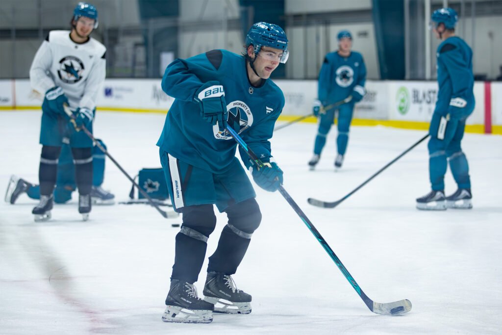 Luca Cagnoni controls the puck during San Jose Sharks practice.