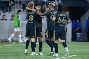 Son Heung-Min (7) celebrates LAFC's 3rd goal off the assist from Jacob Shaffleburg (18) on Wednesday night at BMO Stadium in Los Angeles, CA - photo by Adrian Perez