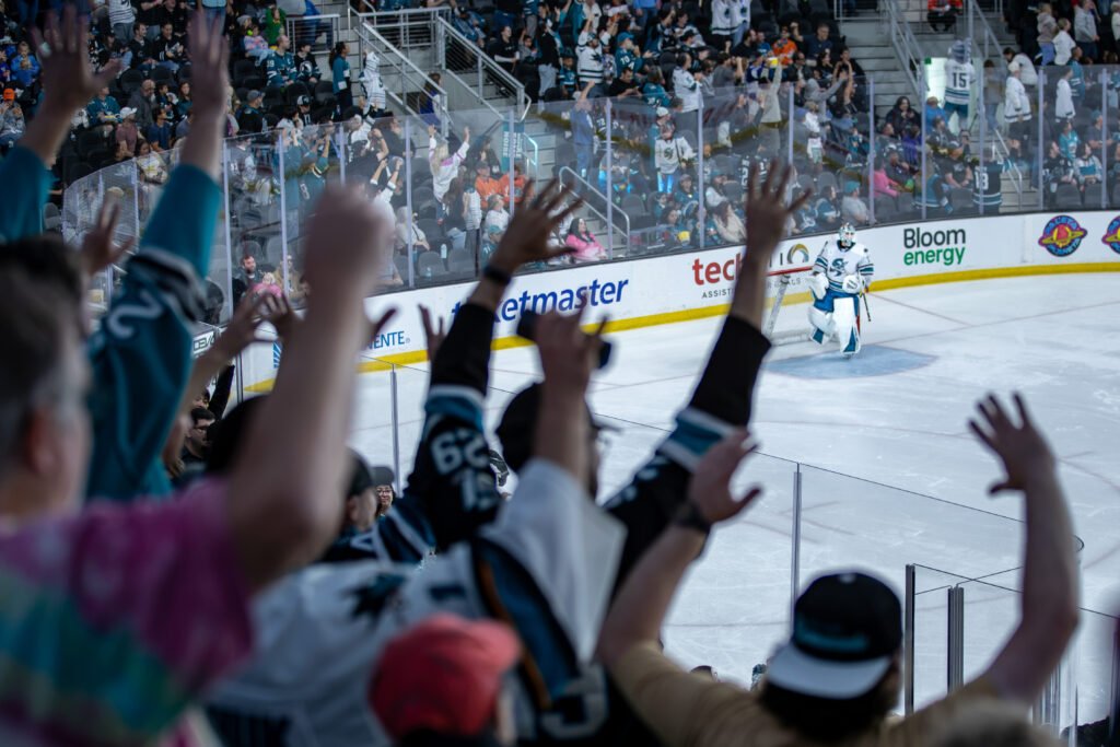 San Jose Barracuda fans celebrate a save by goaltender Eric Comrie during the season opener against the San Diego Gulls at Tech CU Arena.