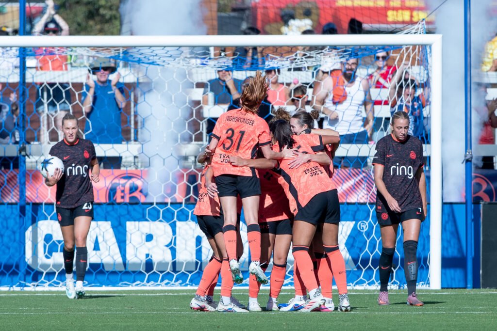 Bay FC players celebrate their second goal against Portland Thorns at PayPal Park.