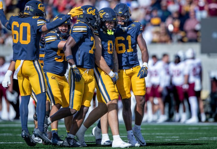 Dorian Thomas celebrates after a 29-yard run for California against Virginia Tech.