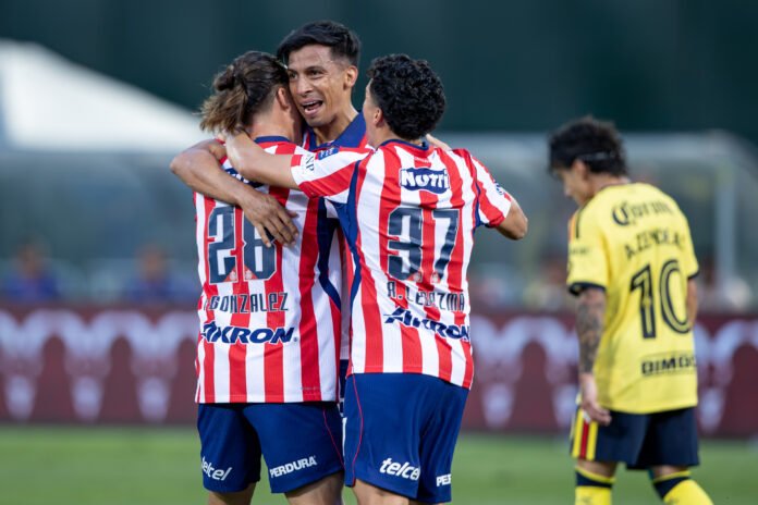 Ángel Sepúlveda celebrates after scoring for Chivas de Guadalajara against Club América at the Oakland Coliseum.