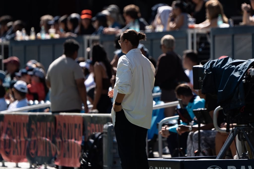 Bay FC head coach watches the action from the sideline during the NWSL match against Portland Thorns at PayPal Park.