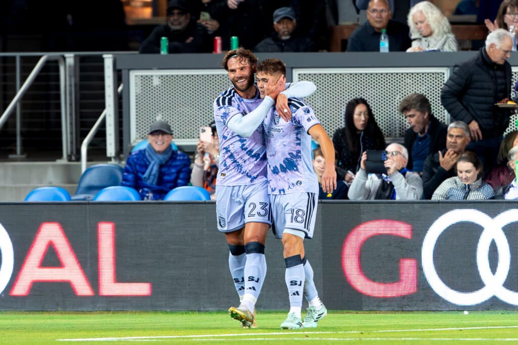 San Jose Earthquakes player No. 2 embraces teammate No. 18 as they celebrate the team's opening goal against Colorado Rapids during their MLS match at PayPal Park on October 28, 2026.