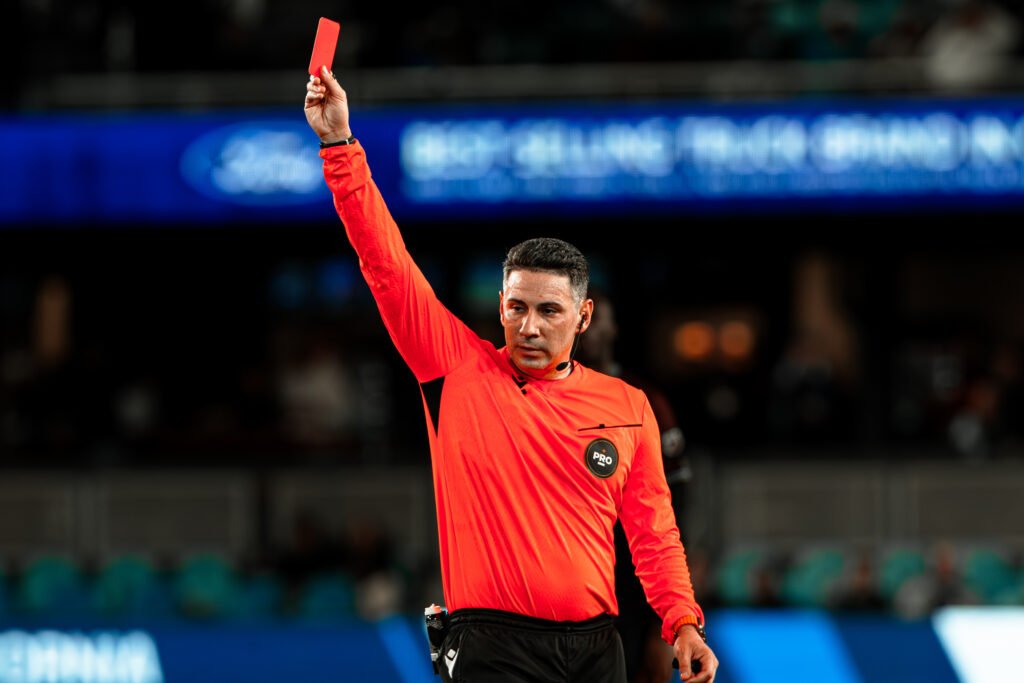 Referee Ramy Touchan shows a red card to Colorado Rapids defender Kosi Thompson (33) during the Major League Soccer (MLS) match between San Jose Earthquakes and Colorado Rapids at PayPal Park in San Jose, California. Thompson was sent off in the 75th minute, leaving Colorado Rapids with ten players.