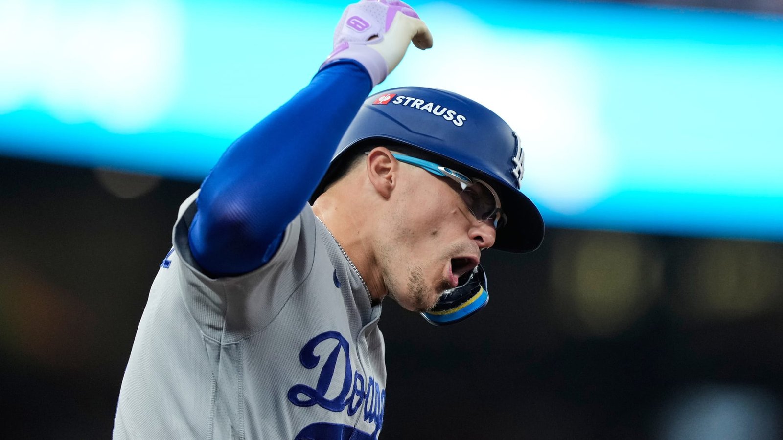 Kiké Hernández celebrating in his Dodgers road uniform